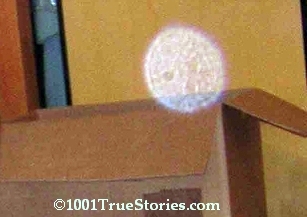 Strange structured round, flying object, invisible for eyes, visible on photos taken with flash